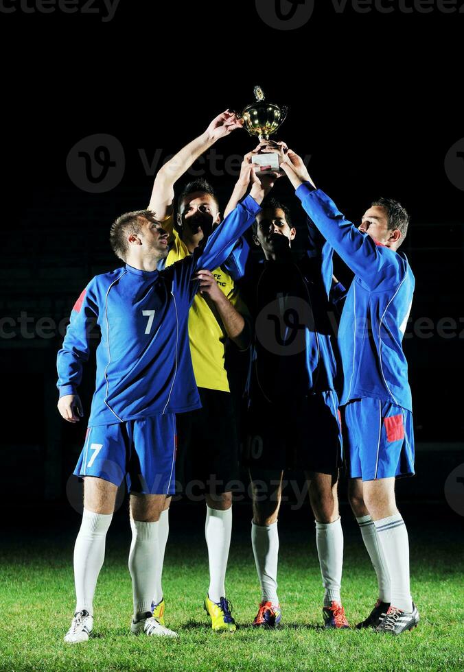 fotboll spelare fira de seger foto