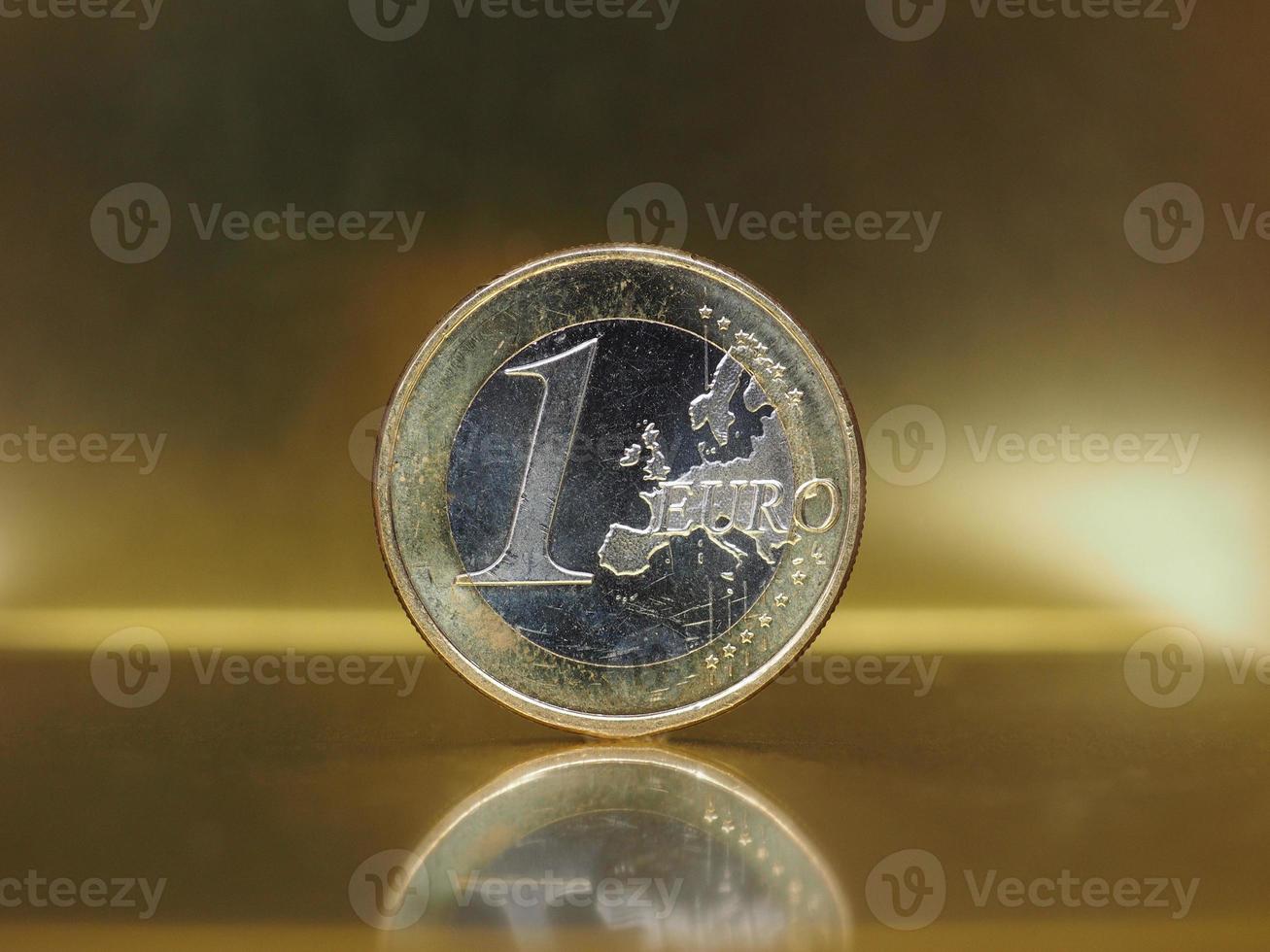 1 euromynt, Europeiska unionen över guldbakgrund foto