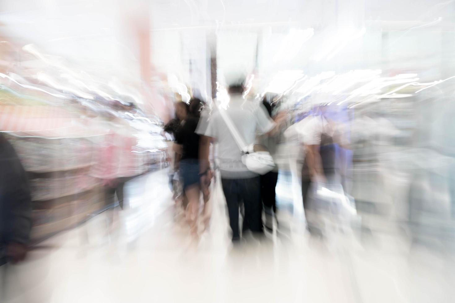 abstrakt oskärpa människor i vackra lyxiga köpcentrum foto