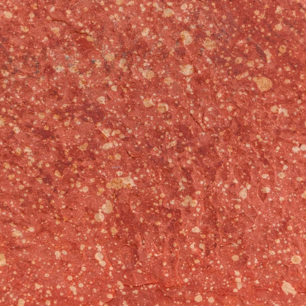 röd grov sten textur bakgrund. foto