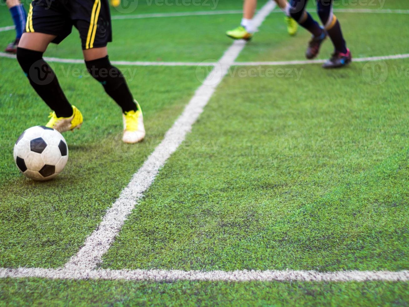 fotbollsspelarna tävlar i grundskolans sportdag foto