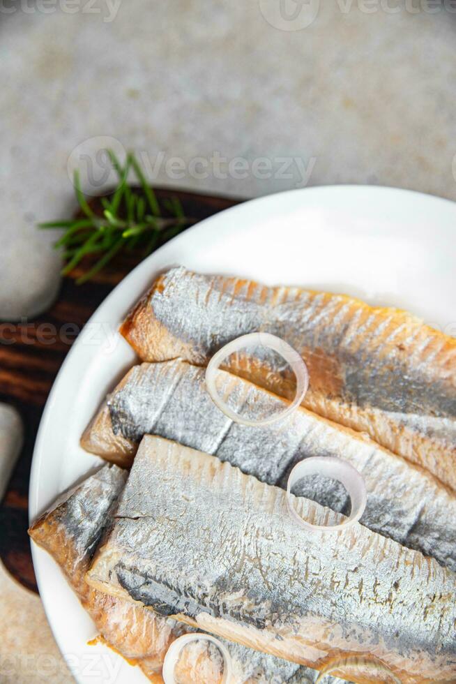 sill färsk saltade fisk gott skaldjur friska äter matlagning aptitretare måltid mat mellanmål pescetarian diet på de tabell kopia Plats foto