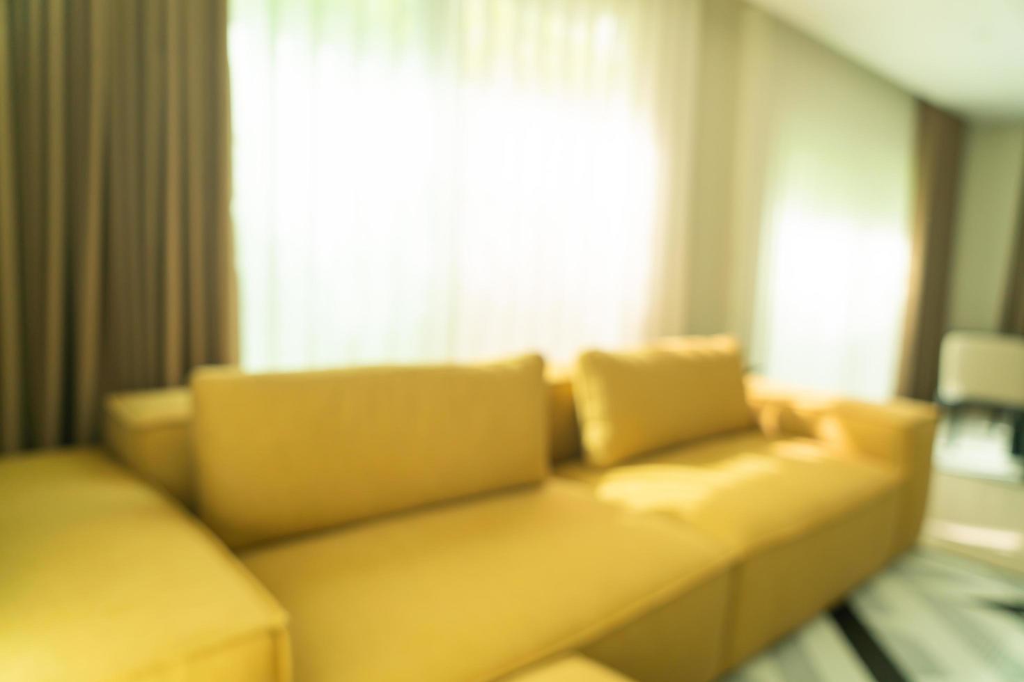 abstrakt oskärpa modernt och lyxigt vardagsrum för bakgrund foto