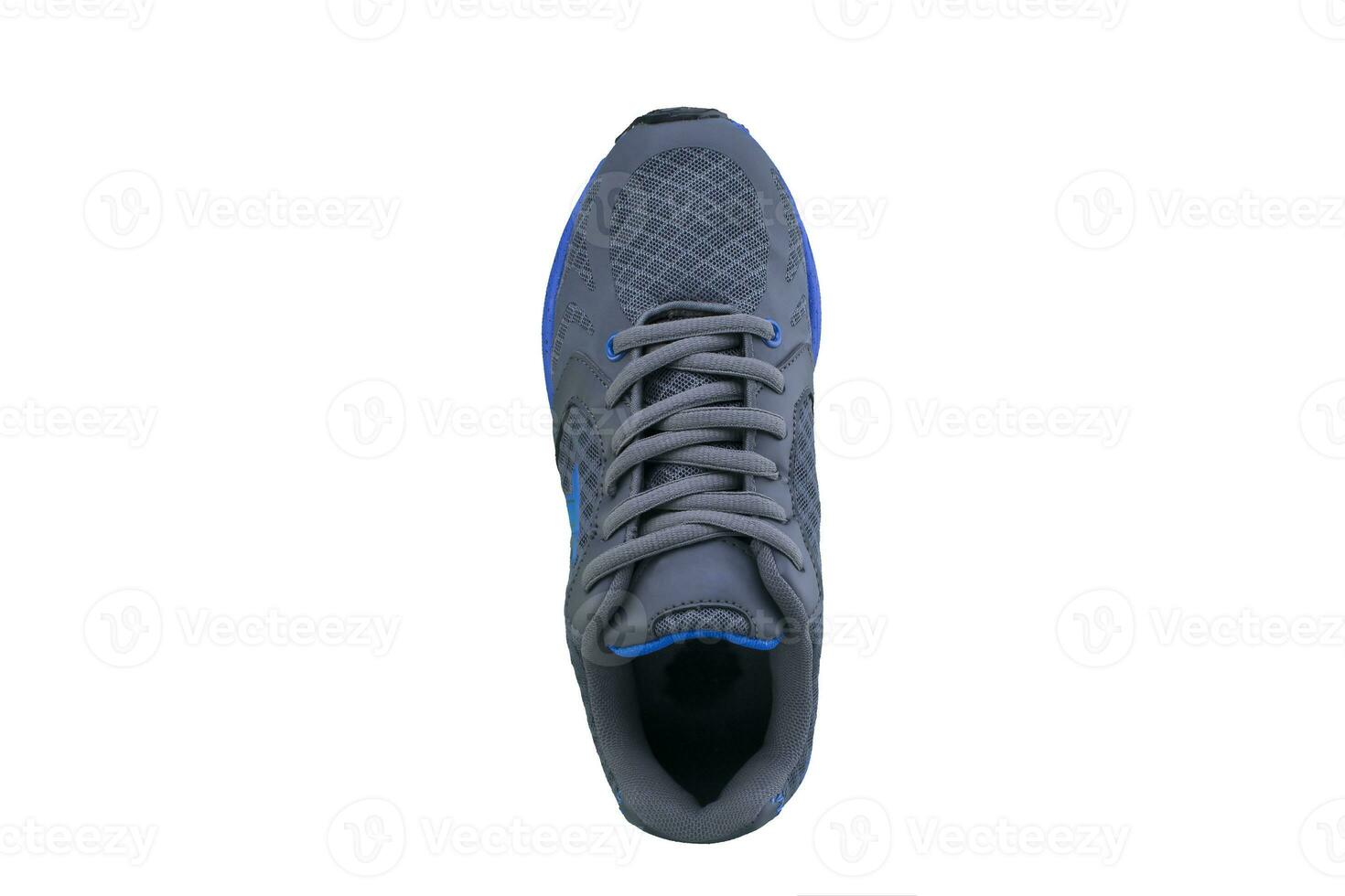 gymnastiksko grå med blå sulor. sport skor på vit bakgrund foto