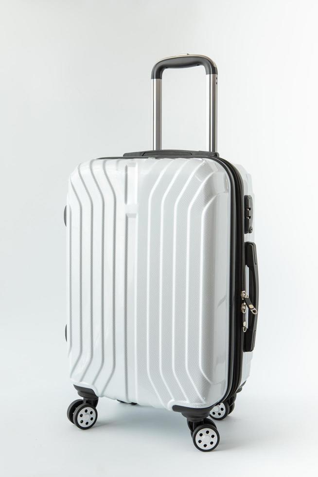 vit bagage hatt resa resa till destination långhelg semester foto