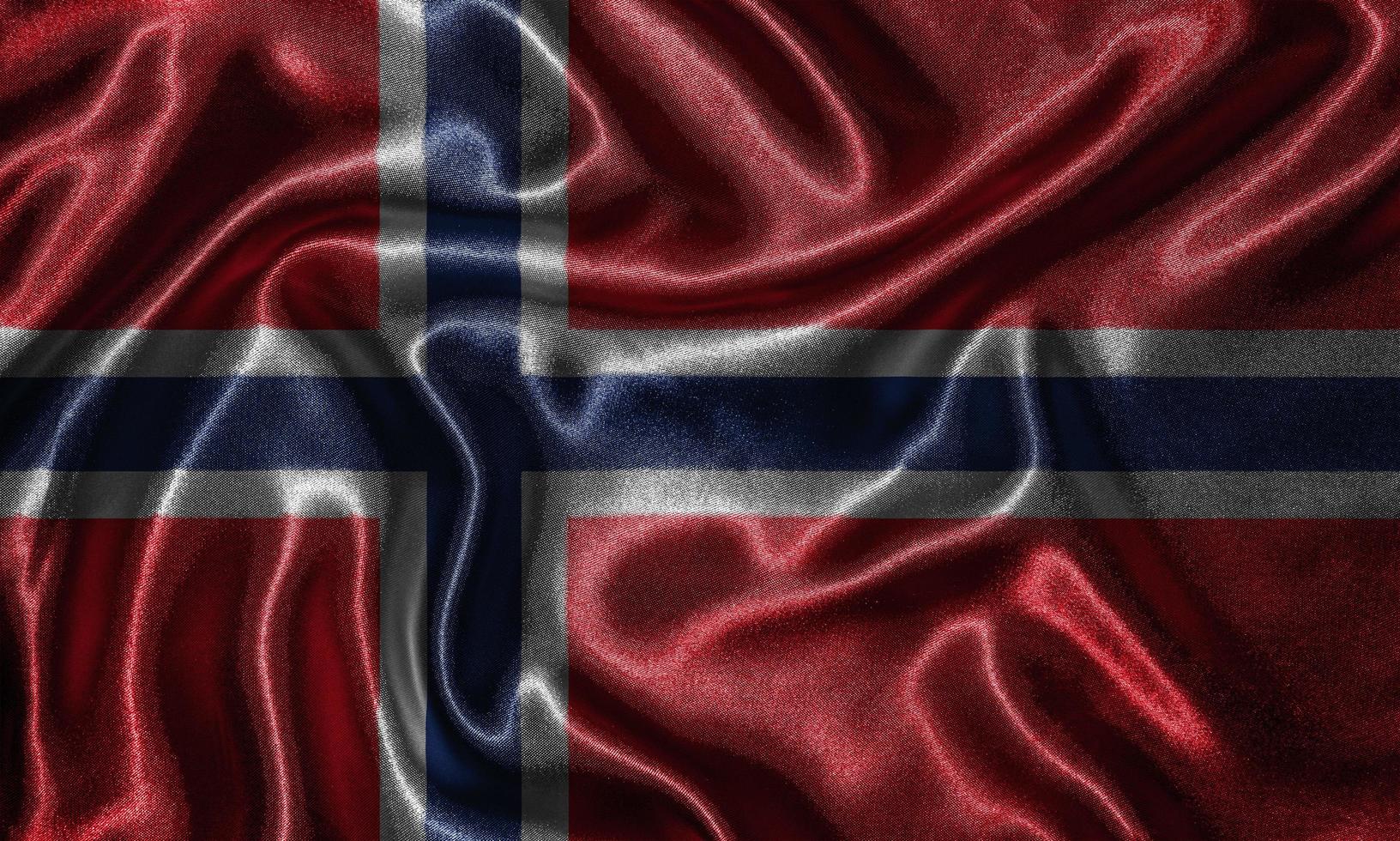 tapeter av norska flaggan och viftande flagga av tyg. foto