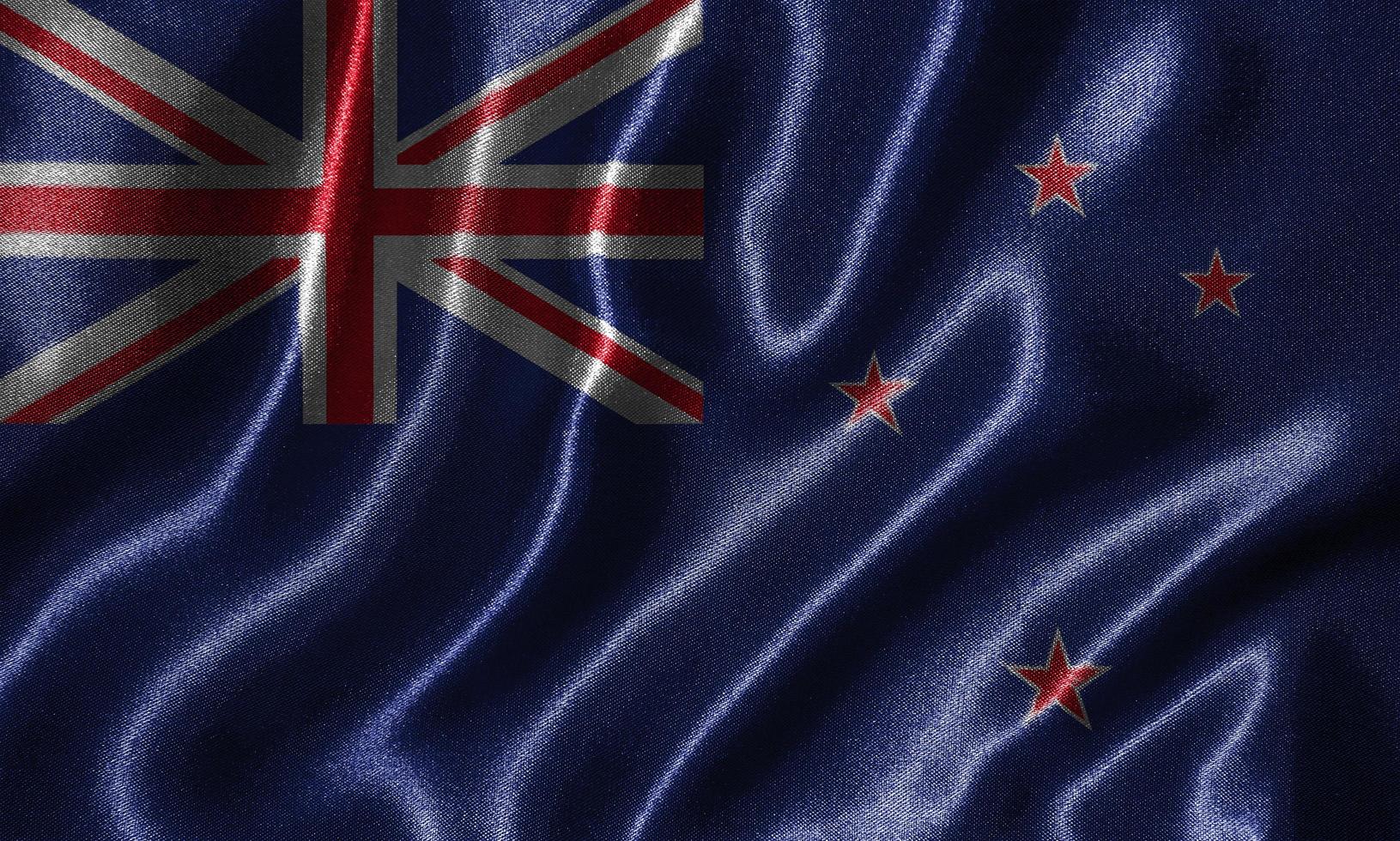 tapeter av Nya Zeelands flagga och viftande flagga av tyg. foto