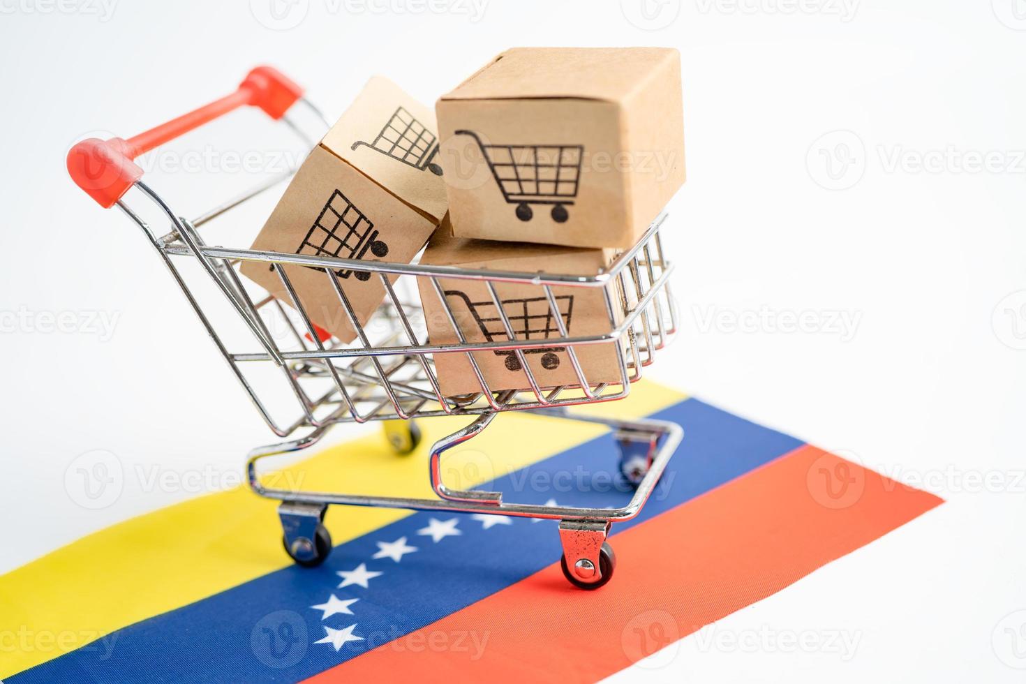 låda med kundvagnslogotyp och venezuela flagga, import export foto