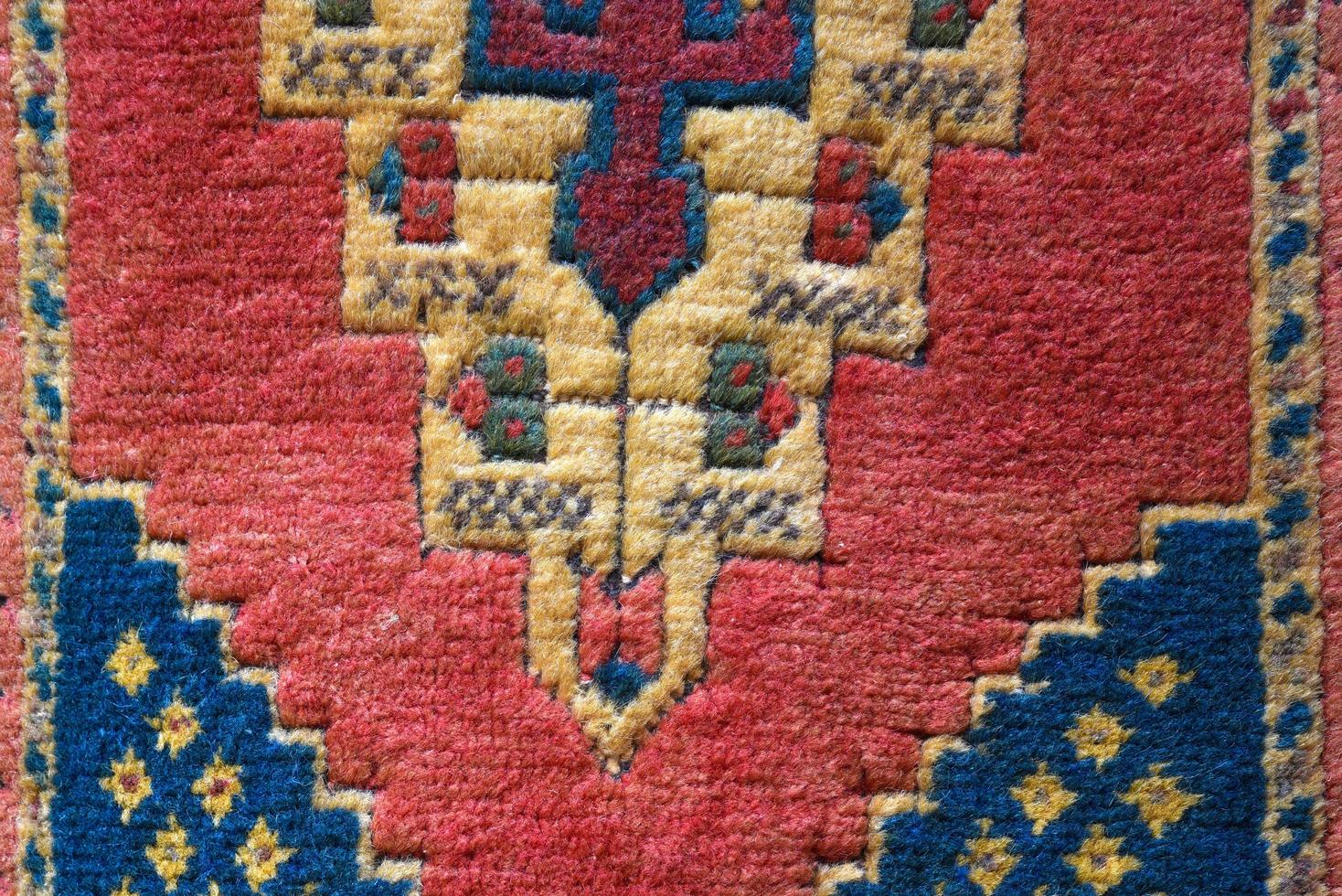 handgjorda turkiska mattor kläder upp mönster foto