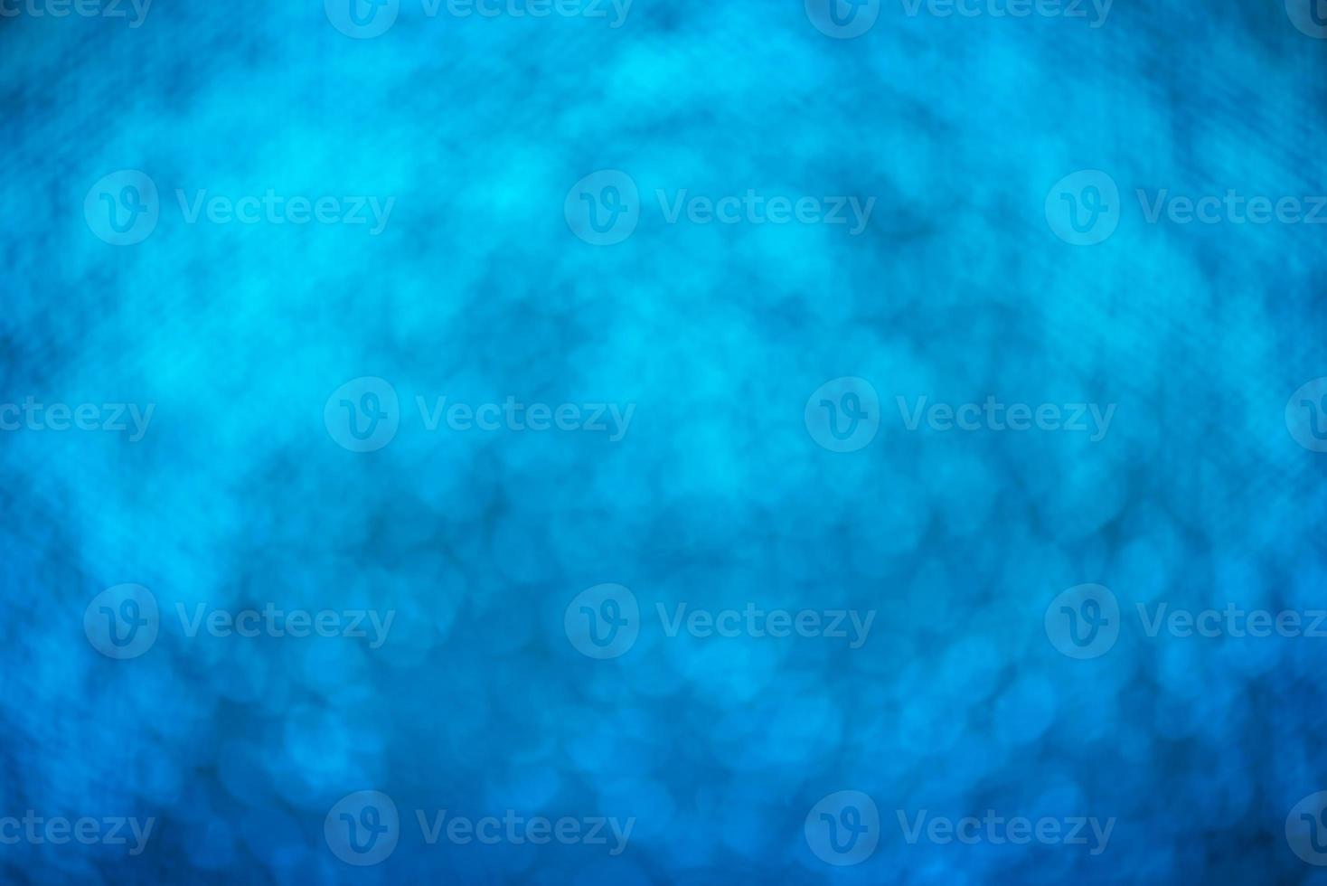 defocus light glitter. abstrakt blå bokeh bakgrund foto