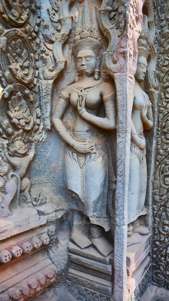 sten carving vid ta prohm tempel, siem skörd kambodja. foto