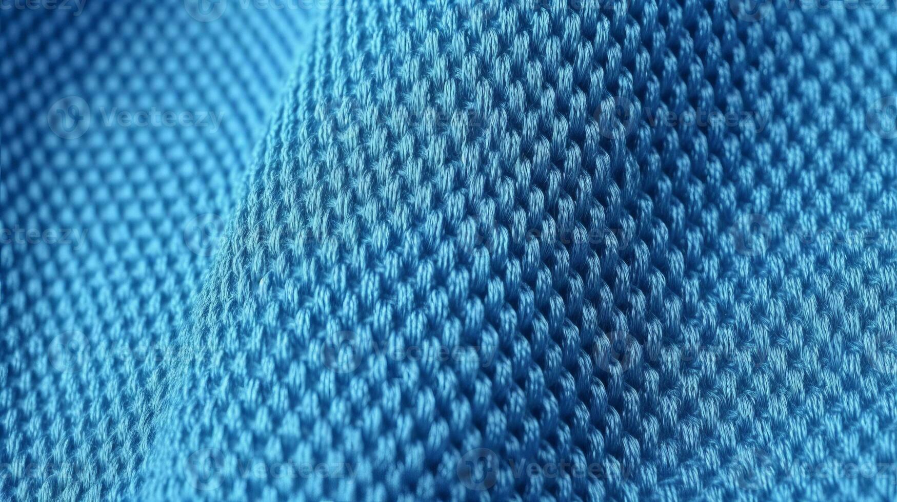 blå fotboll tyg textur med luft maska. sportkläder bakgrund foto