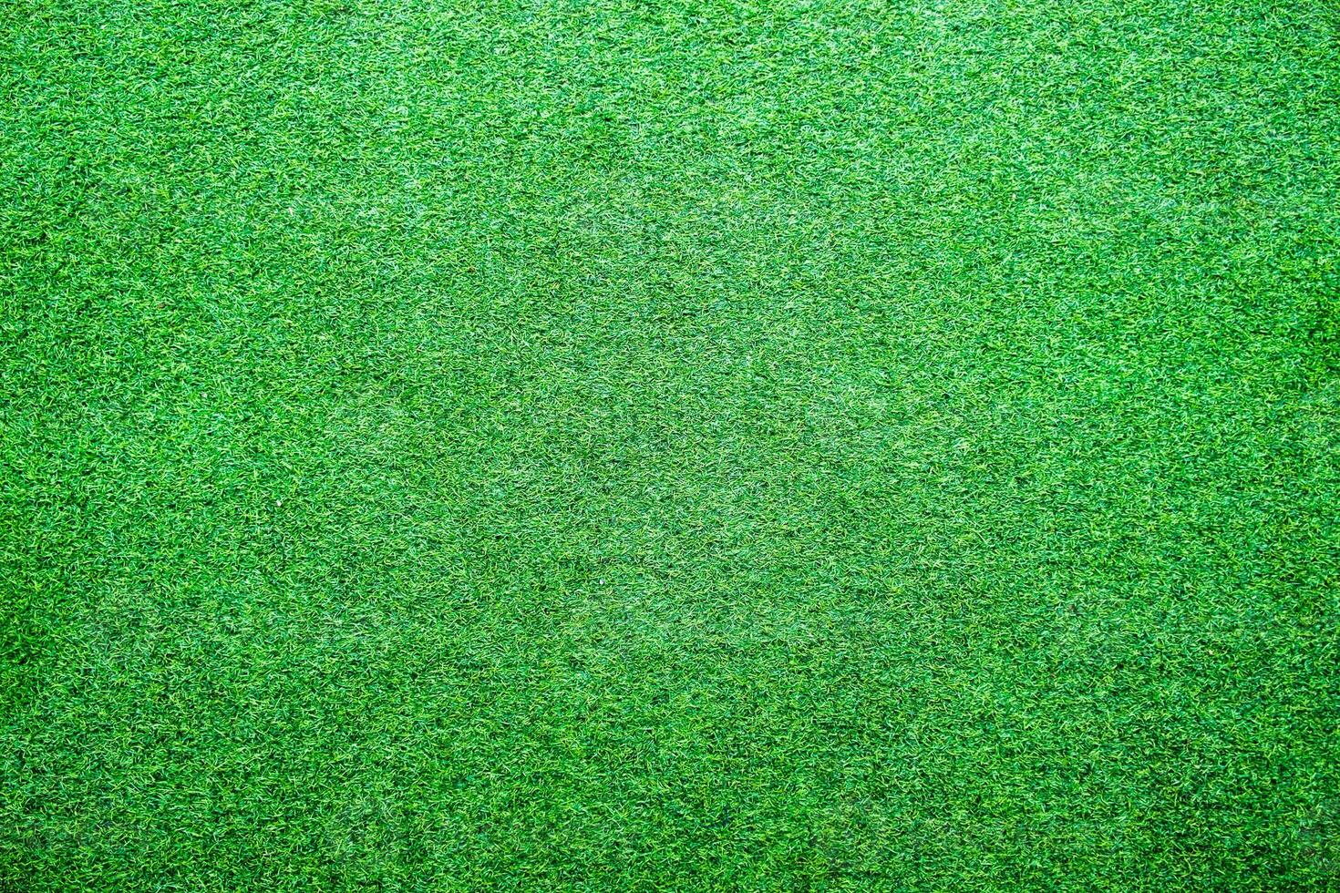 artificiell gräsmatta gräs grön ljus bakgrund foto