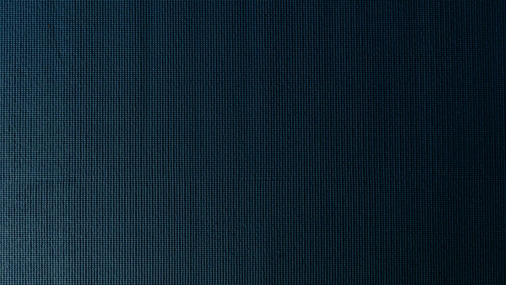 ovan se golv av mjuk matta tillverkad från syntetisk sudd plast med en blå akvarell-stil yta. för bakgrund och texturerat. foto