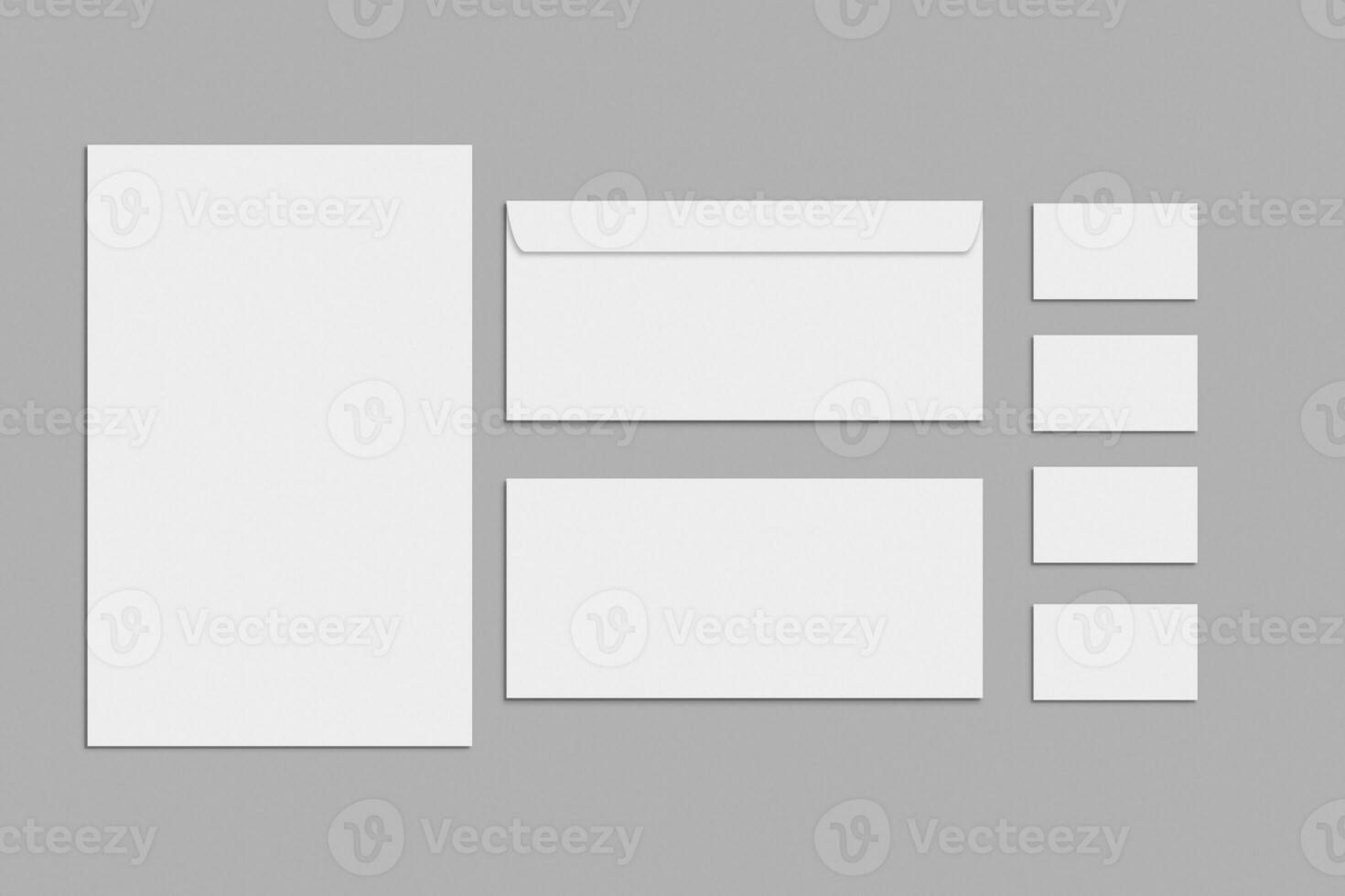tom brevpapper och företags- identitet uppsättning på grå bakgrund. branding mock-up. foto