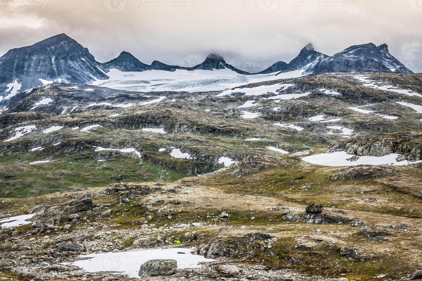 veobrean glaciär sett från glittertind berg jotunheimen nationell parkera, Norge foto