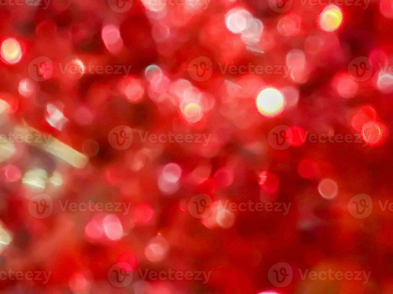 suddig och bokeh röd reflexion av jul dekorerad bakgrund och tapet. foto