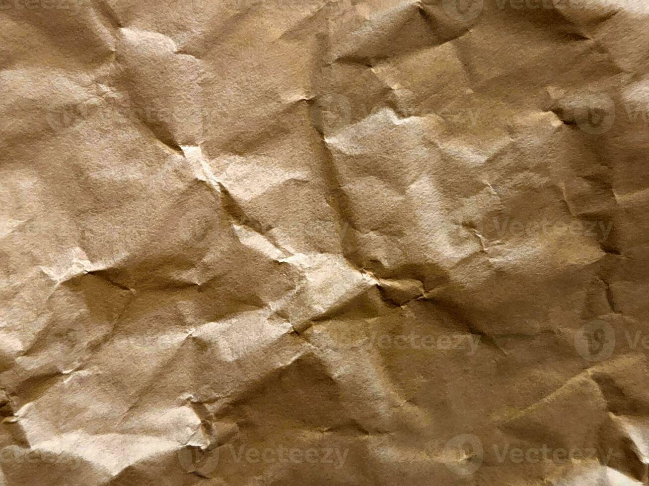 skrynkliga papper. skrynkliga ljus pergament. årgång skrynkliga papper bakgrund foto