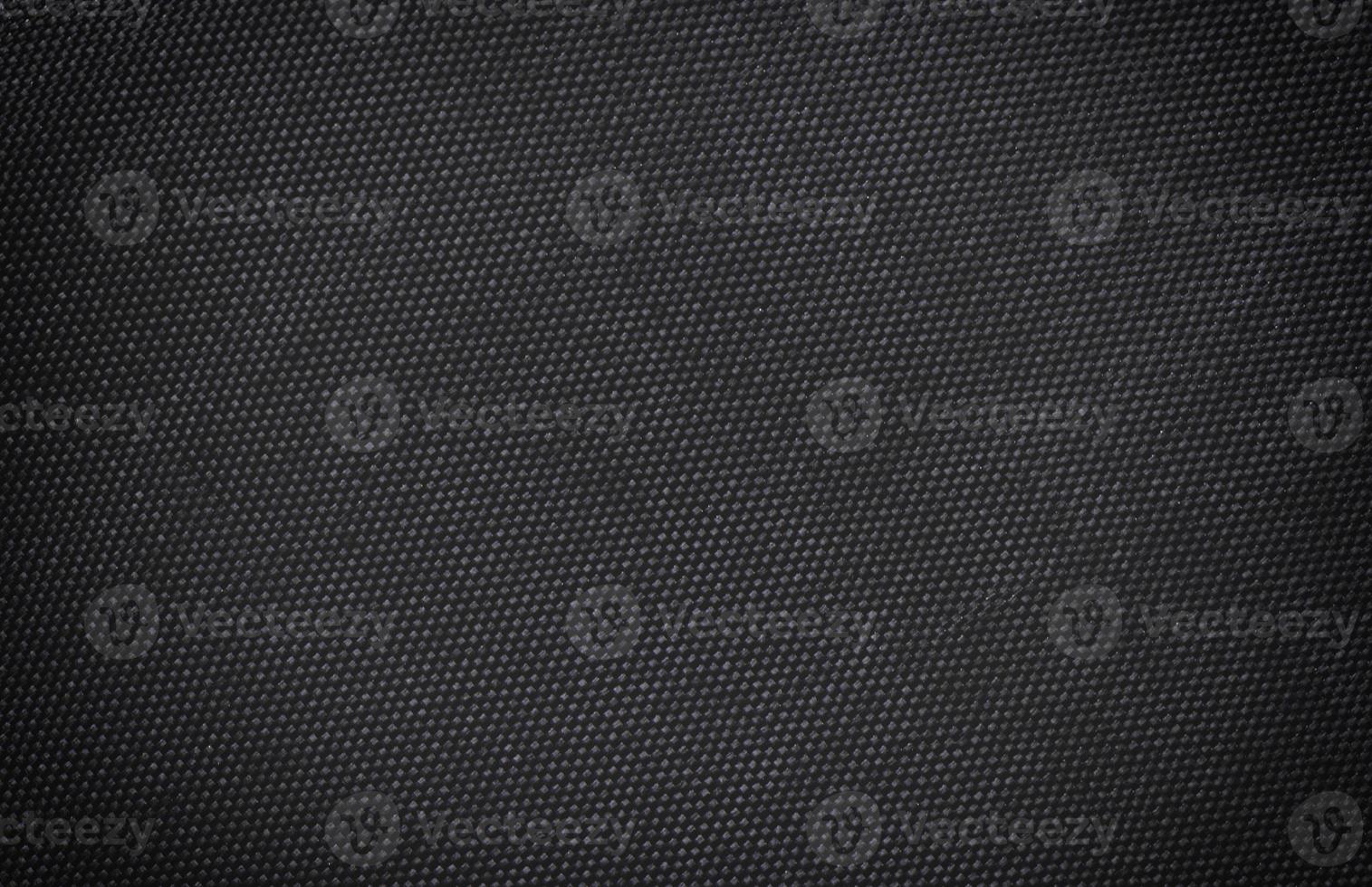 svart tyg duk silke textur bakgrund. abstrakt närbild detalj av textilmaterial tapeter foto