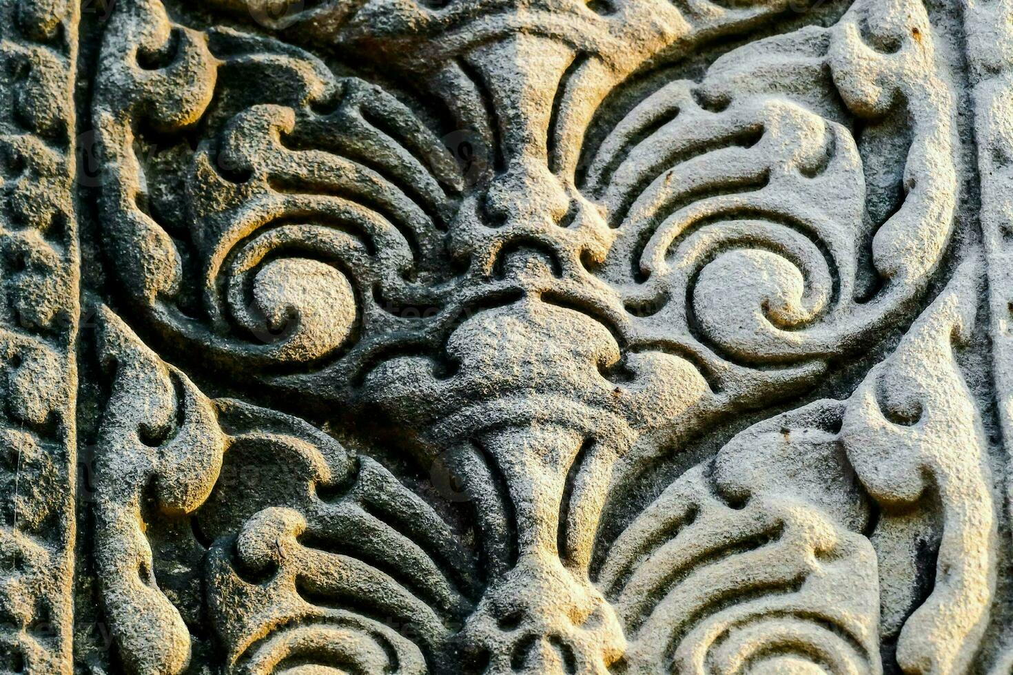 detalj av ristade sten på angkor vad, cambodia foto