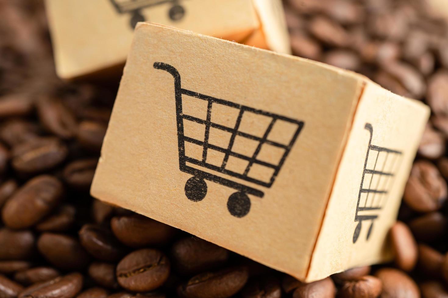 låda med kundvagn logotyp symbol på kaffebönor, import export shopping online eller e -handel leverans service butik produkt frakt, handel, leverantör koncept foto