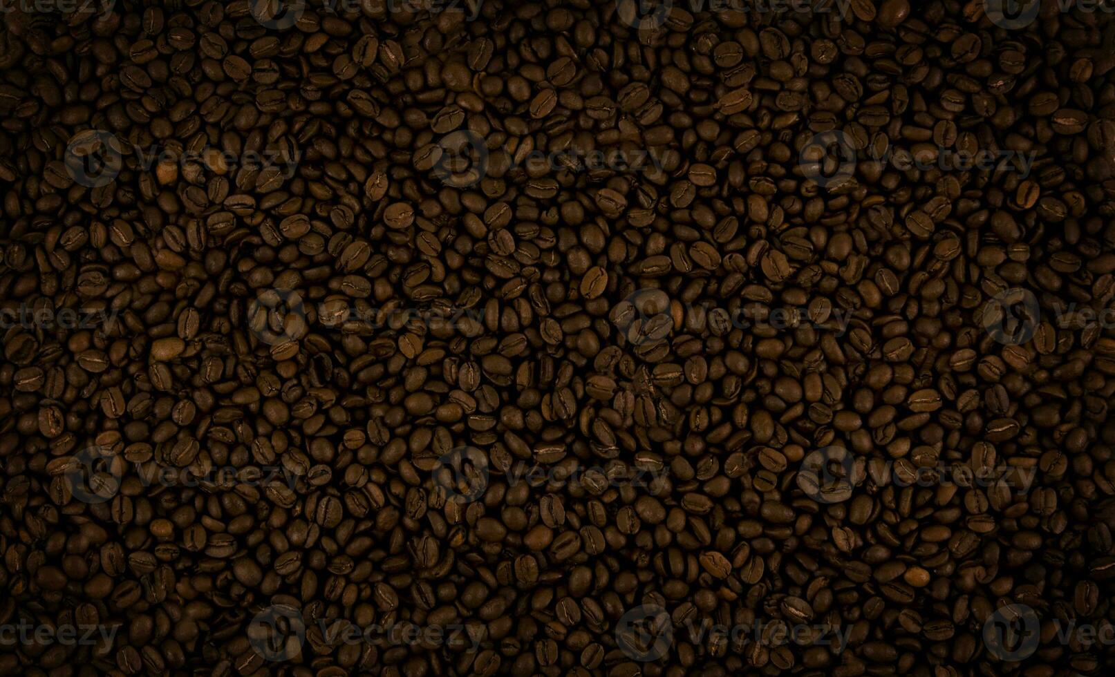 rostad kaffe bönor. textur av kaffe bönor. kaffe bakgrund. foto