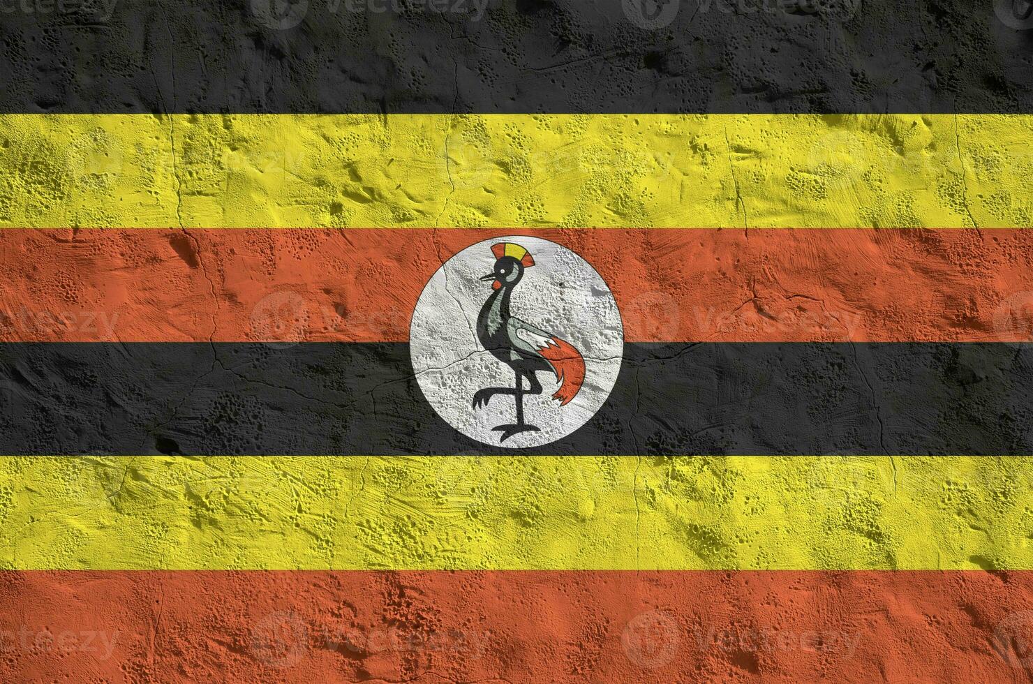 uganda flagga avbildad i ljus måla färger på gammal lättnad putsning vägg. texturerad baner på grov bakgrund foto