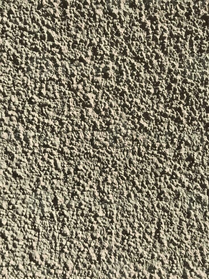 marmor yta sten. smutsig grov betong vägg.cement vägg texturerad bakgrund foto