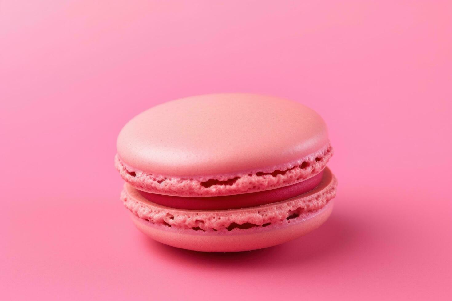 ai genererad rosa macaron isolerat på en rosa bakgrund foto