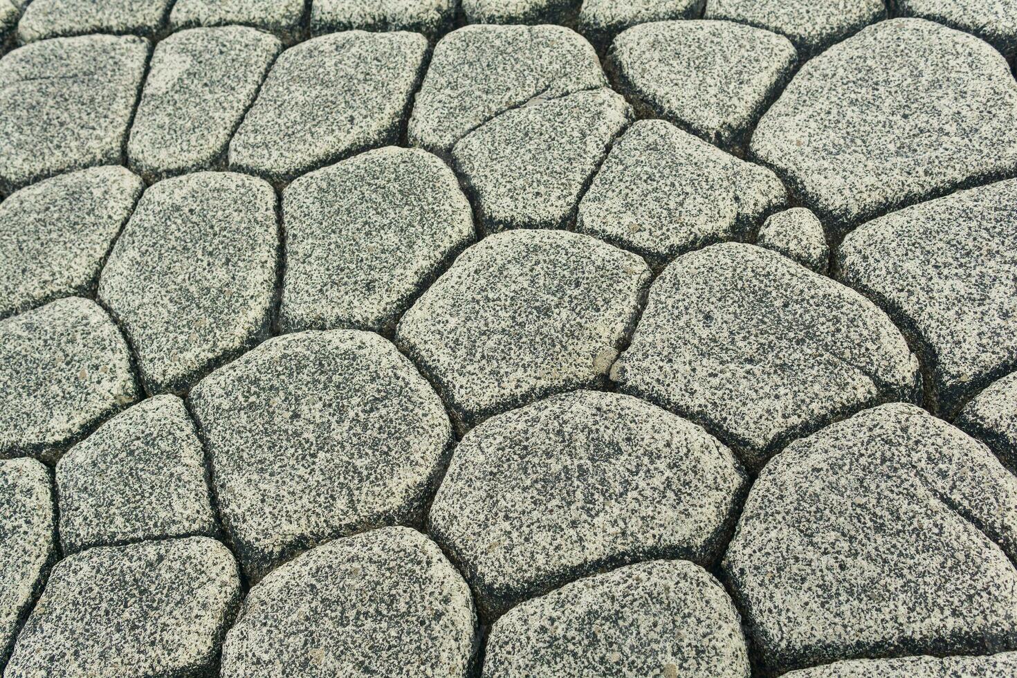 naturlig sten bakgrund, de resterna av lava basalt kolonner form en snäll av kullersten gångbro foto