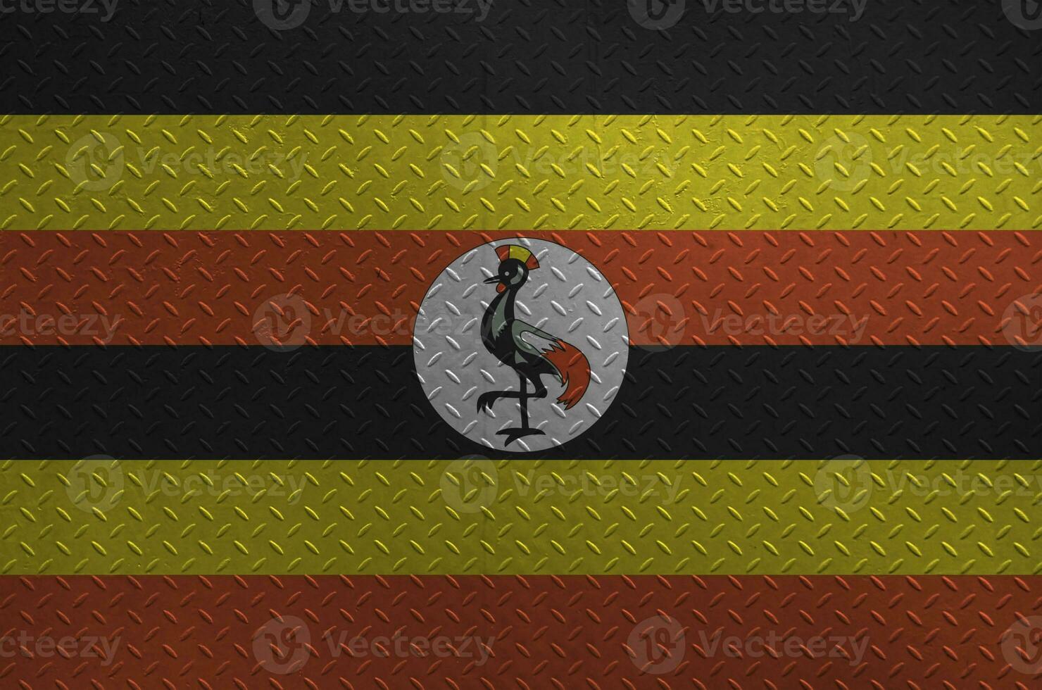 uganda flagga avbildad i måla färger på gammal borstat metall tallrik eller vägg närbild. texturerad baner på grov bakgrund foto