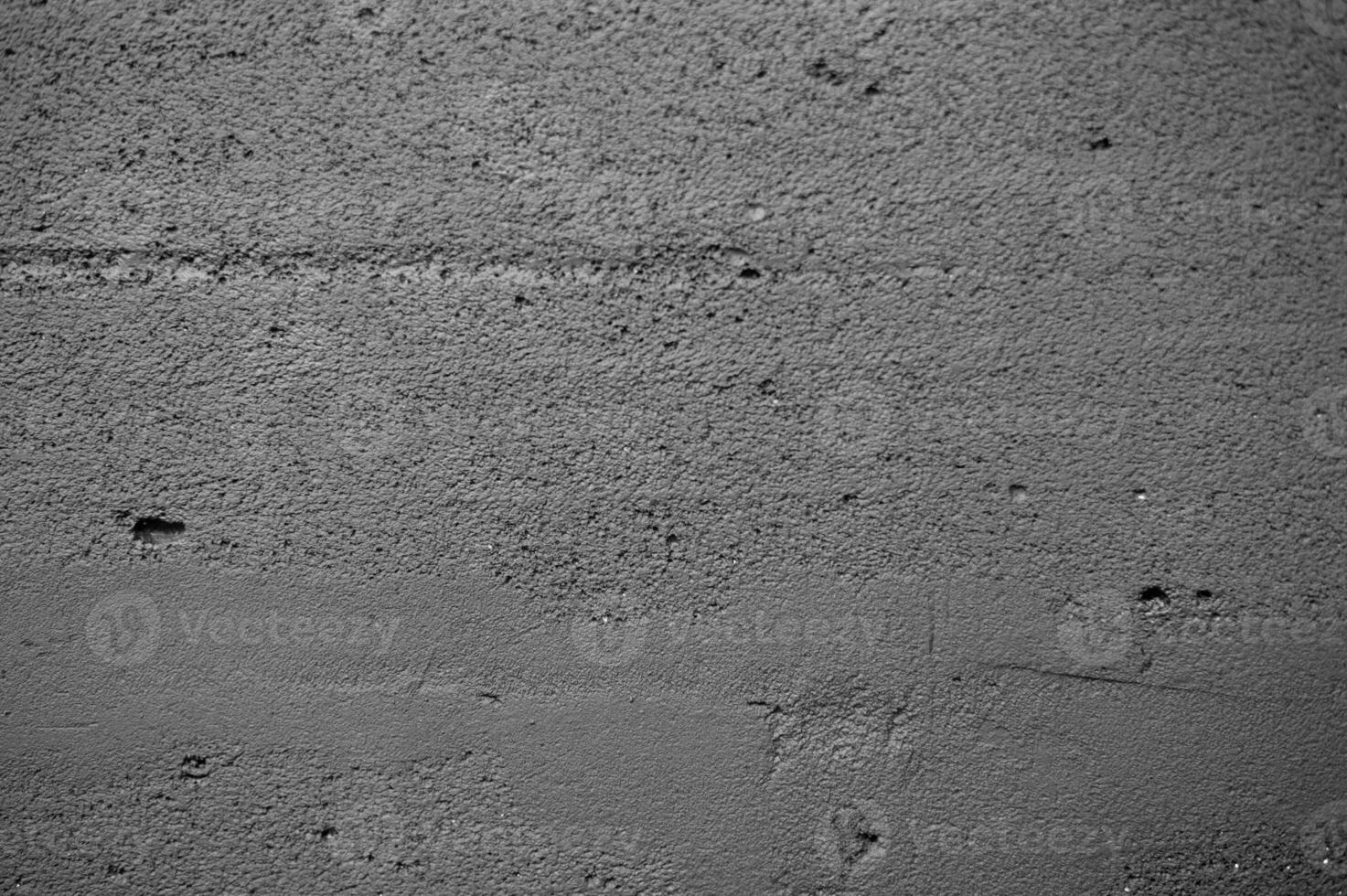 årgång grunge grå bakgrund av naturlig cement eller sten gammal textur som retro mönster vägg. den är konceptuell eller liknelse vägg baner, material, åldrig, rost eller konstruktion foto