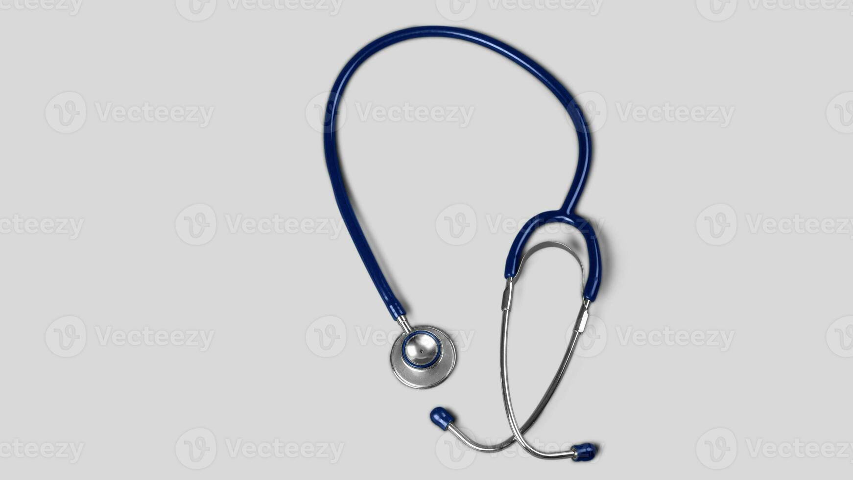 isolerat stetoskop på vit bakgrund, medicinsk Utrustning begrepp foto