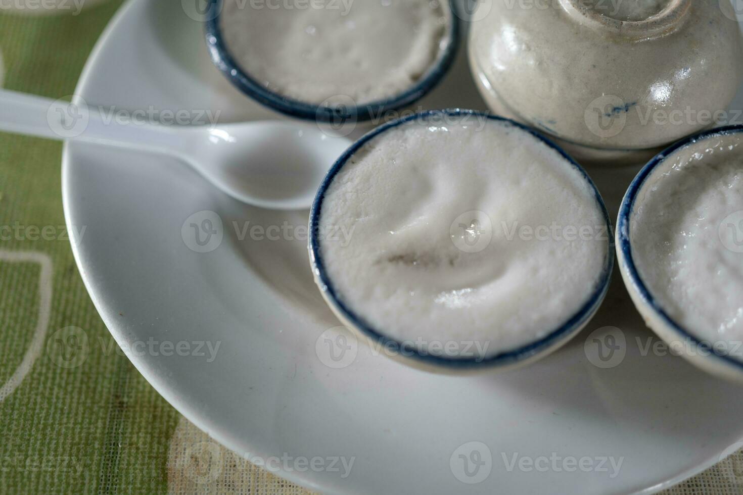 kanom Tuay, thai ljuv desserter tillverkad från kokos mjölk och kokos socker foto