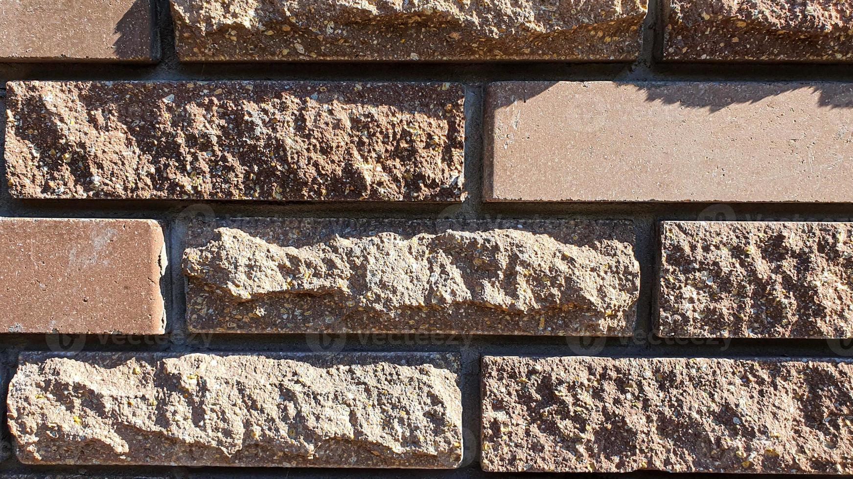 vägg- och golvmurverk. olika stenstrukturer. mångfärgad bakgrund. foto