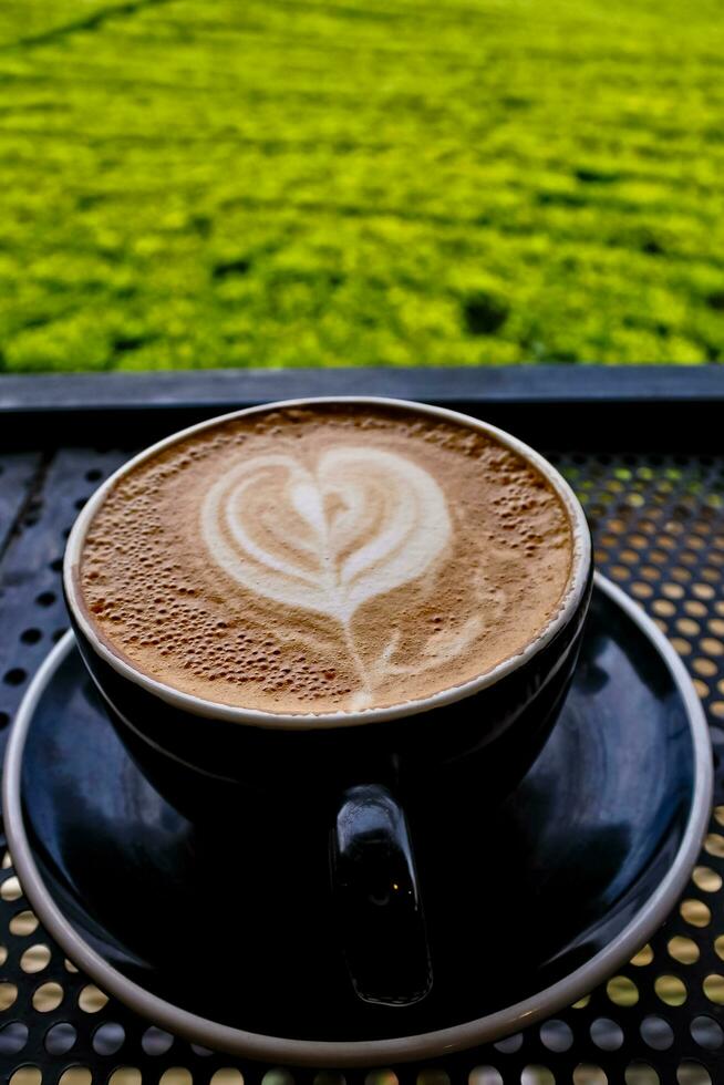 stänga upp se av en kopp av cappuccino kaffe foto