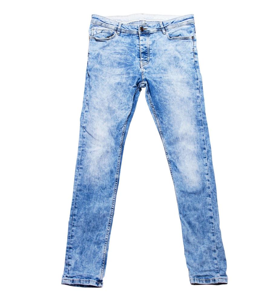 blå jeansbyxor på vitt närbild kopia utrymme, blå jeans bakgrund foto