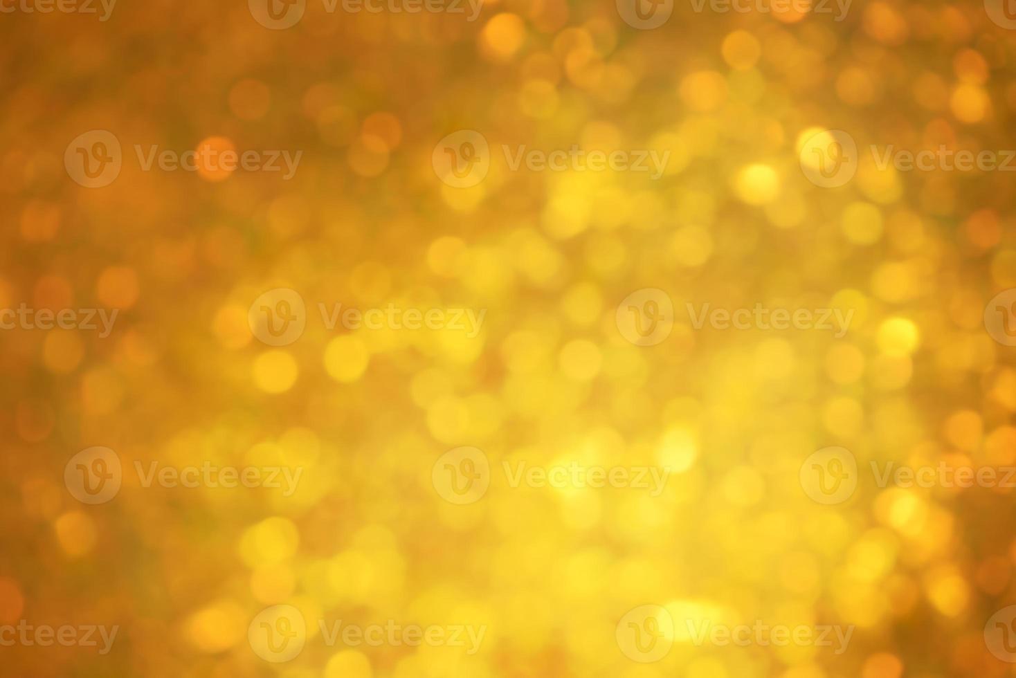 defocus ljus gyllene julfärg. glitter bakgrund, nytt år. foto