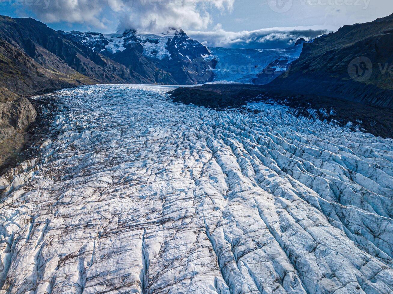 svnafellsjkull glaciär i island. topp se. skaftafell nationell parkera. is och aska av de vulkan textur landskap, skön natur is bakgrund från island foto