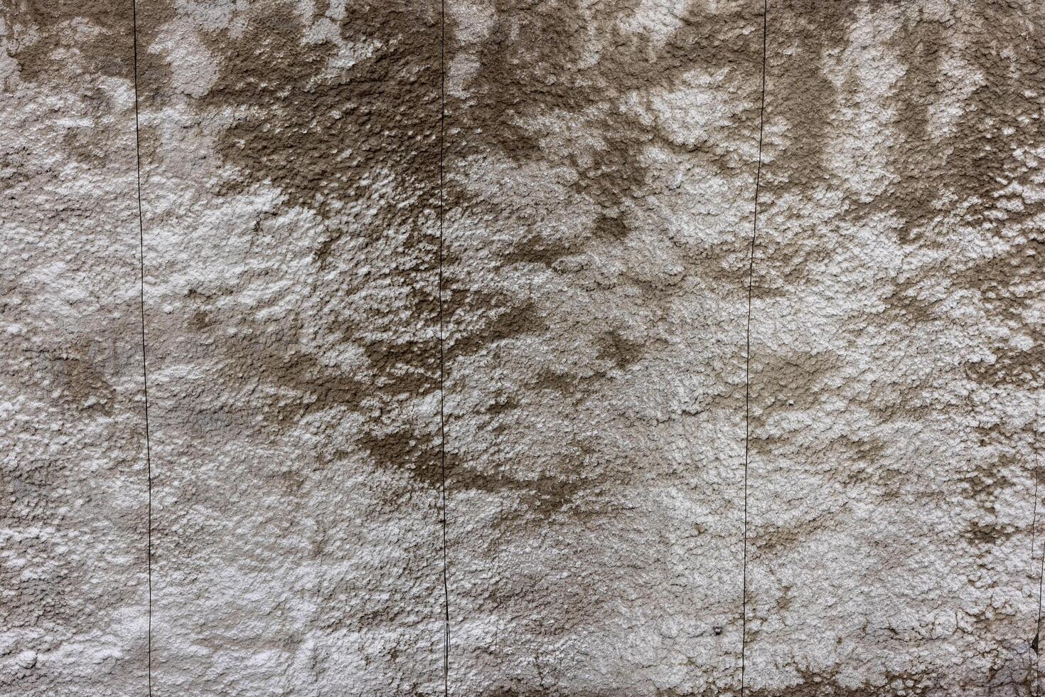 grov betong vägg med riden textur effekt och fick syn på nedskärningar foto