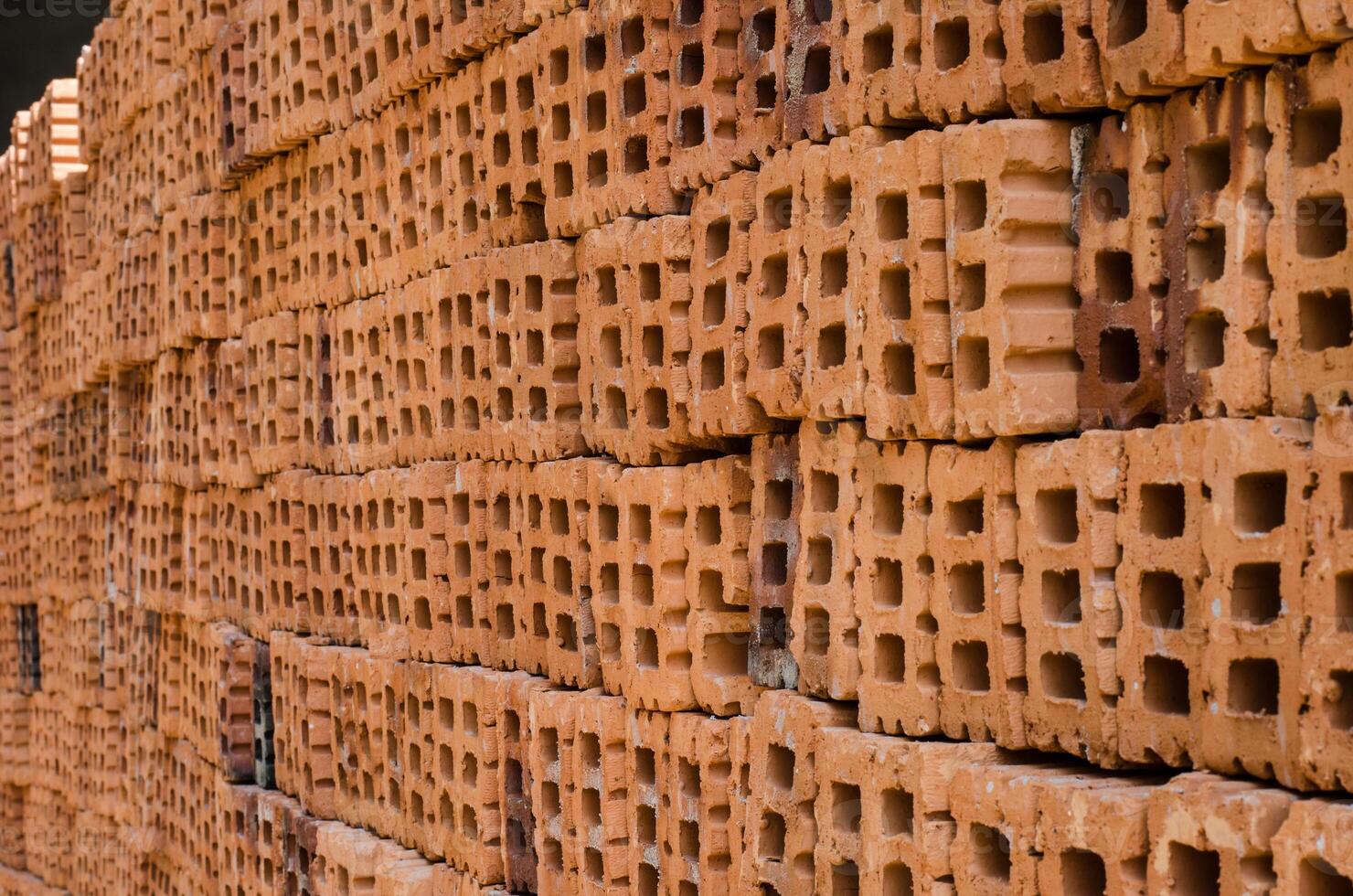 orange tegelstenar Begagnade i de konstruktion foto