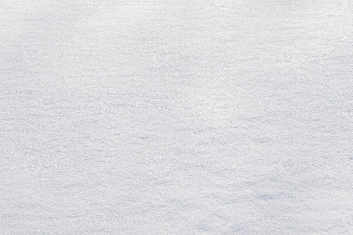 vit rena skinande snö bakgrund textur. färsk snö sömlös textur. snöig yta närbild foto