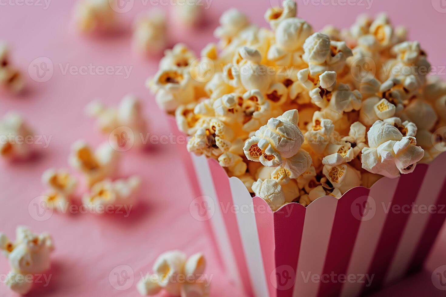 ai genererad närbild randig papper låda fylld med utsökt popcorn på en rosa bakgrund foto