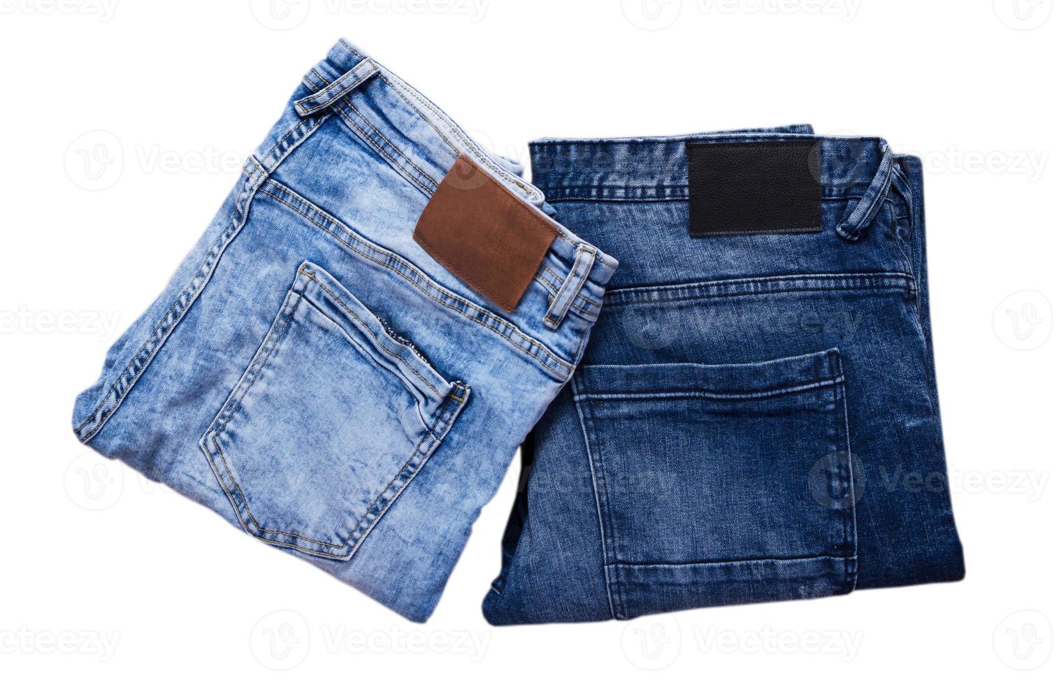 vikta jeans, blå och mörkblå jeans på vit bakgrund eller collage foto