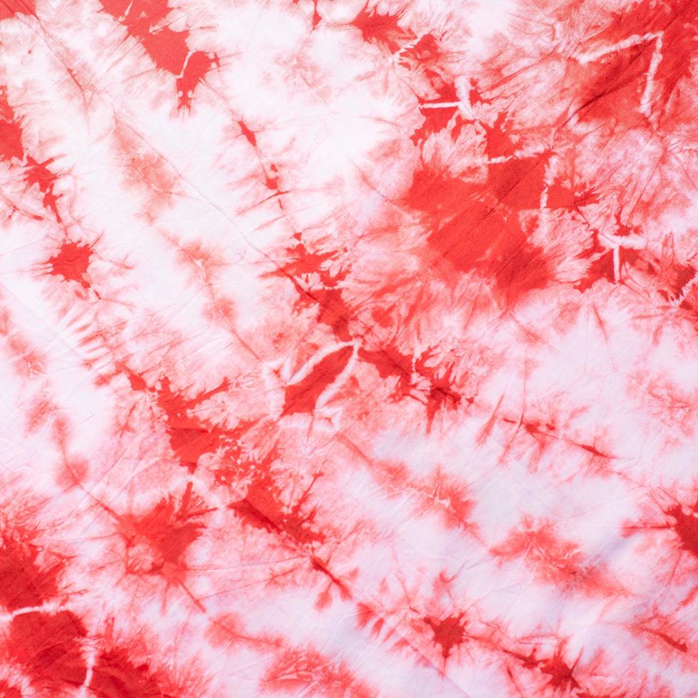 vackert rött och vitt mönster med tie dye effekt foto
