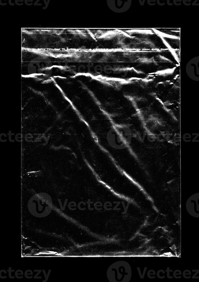 transparent klar plast med en svart bakgrund foto
