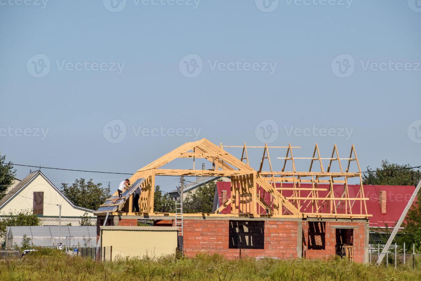 tak av de hus under konstruktion foto