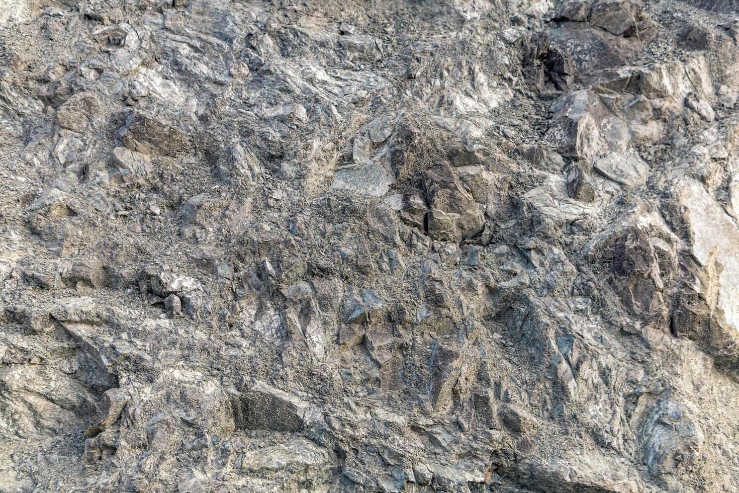 bakgrund, textur - grå vild sten, sten yta foto