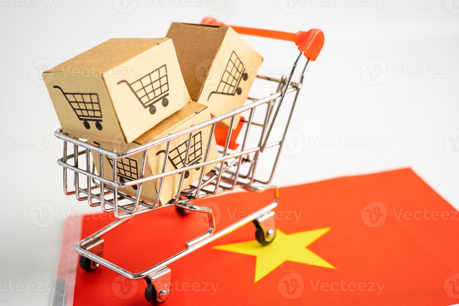 låda med shopping online kundvagn logotyp och vietnam flagga, import export shopping online eller handel finans leverans service butik produkt frakt, handel, leverantör koncept. foto