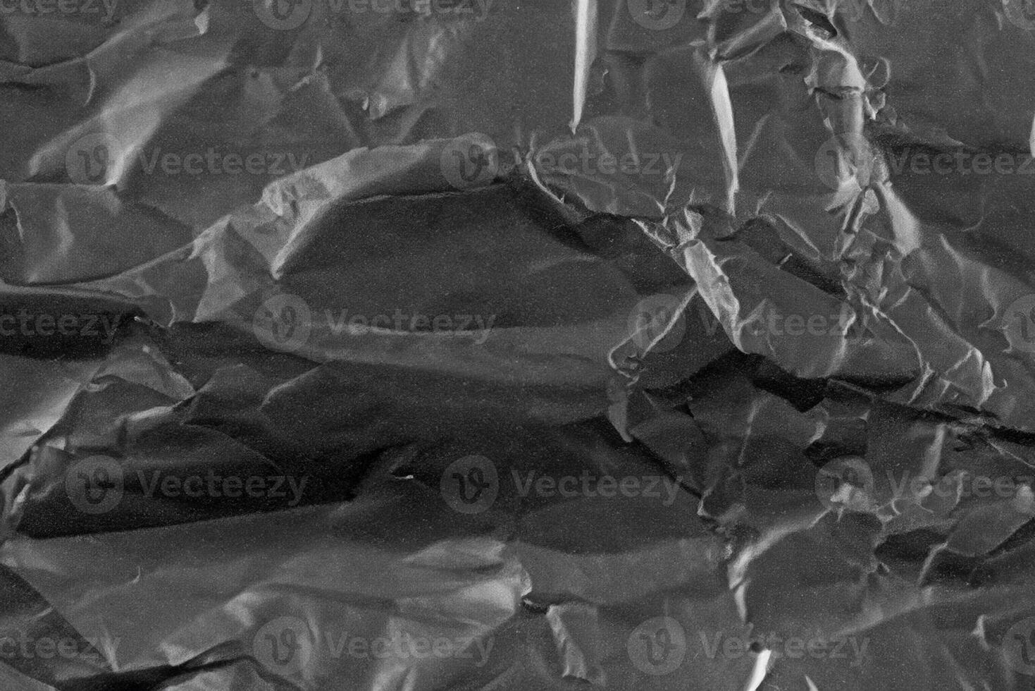 abstrakt bakgrund skrynkliga plast filma textur svart sopor väska foto